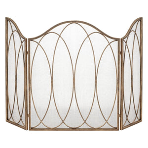Decorative metal fireplace screen with a white background