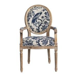 A classic French-style wooden armchair with a distressed finish, featuring blue and cream floral and bird motifs on the upholstered backrest and seat cushion, set against a plain white background.