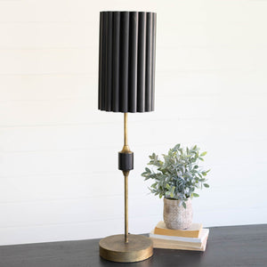 Black and gold table lamp with fluted metal shade