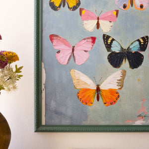 Textured paint detail on the butterfly canvas