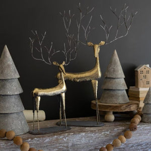 Gilded Branch Reindeer, set of 2 antique gold metal reindeer with branch antlers on a mantel