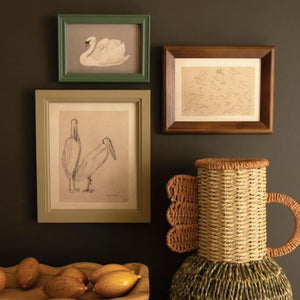 Naturalist Bird Sketch Prints, set of 3 framed bird illustrations on a gallery wall with basket and vase