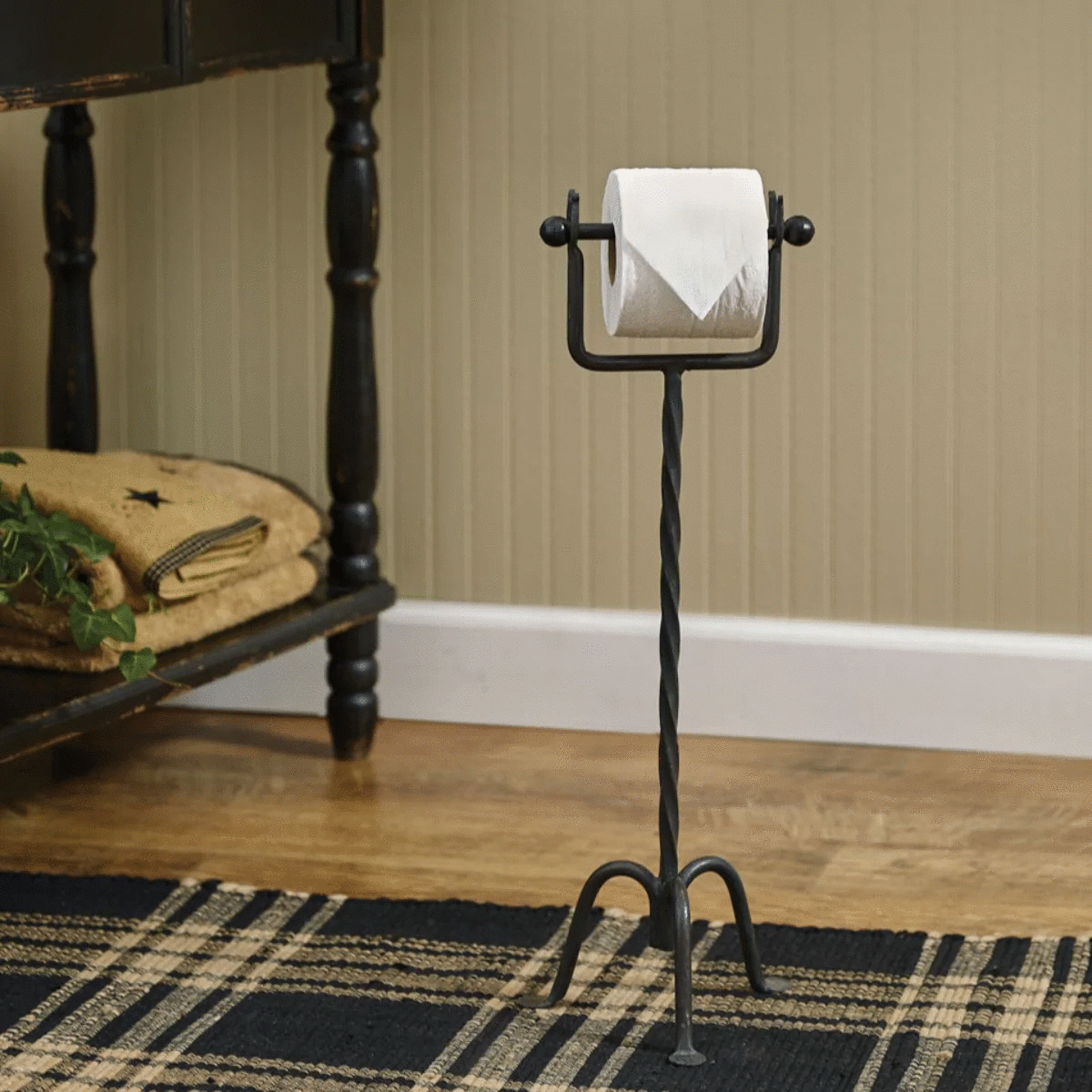 Decorative wrought iron toilet paper holder