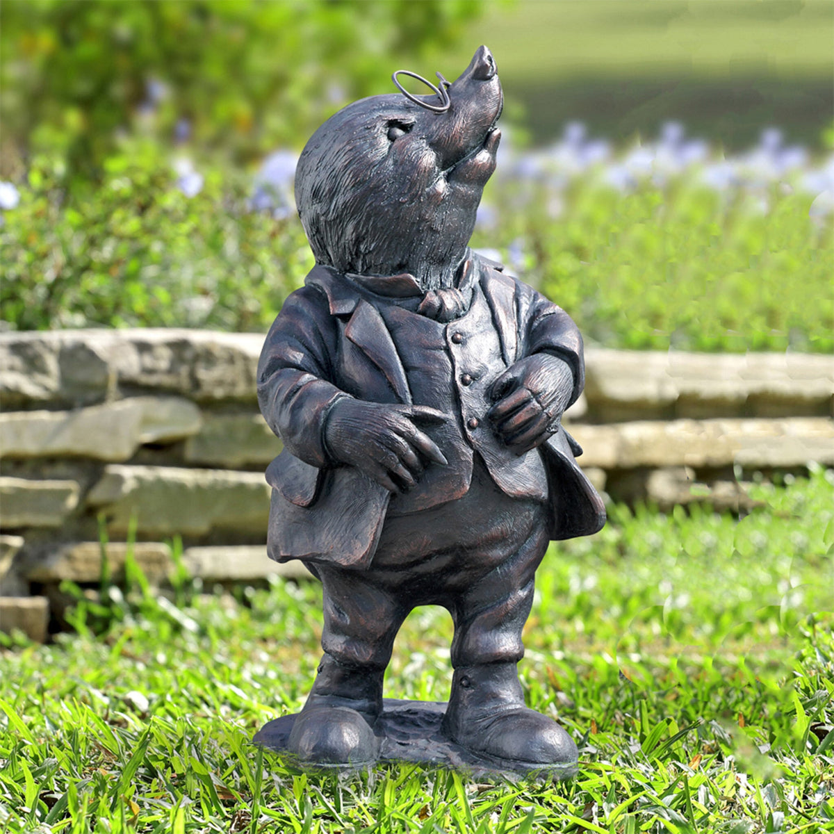 Add a dapper touch with this monocled mole statue. A storybook-inspired cast metal accent for gardens full of charm, character, and quiet elegance.

