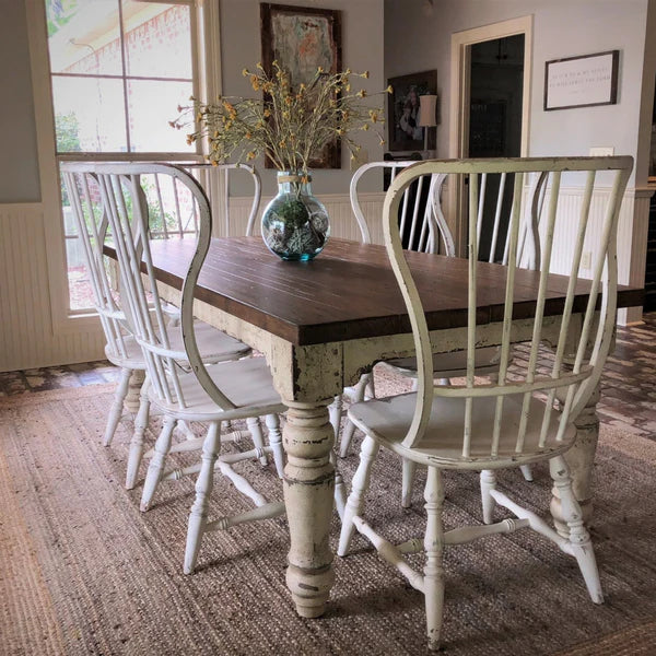 Handcrafted farmhouse dining table with Windsor-style chairs