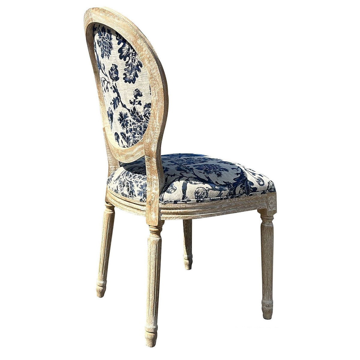 An antique-style dining chair with a distressed light beige wood frame and blue and white toile patterned upholstery on the seat and oval backrest, shown on a white background with a product code text overlay in the bottom right.