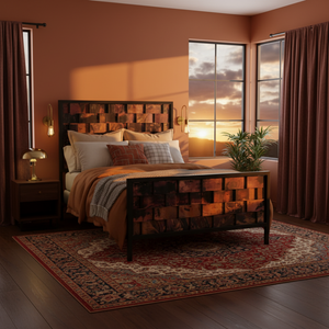 A bed with a dark metal frame and a headboard and footboard made of rectangular wood panels in warm brown, bronze, and copper tones, styled in a bright bedroom with large windows and a view of green hills.