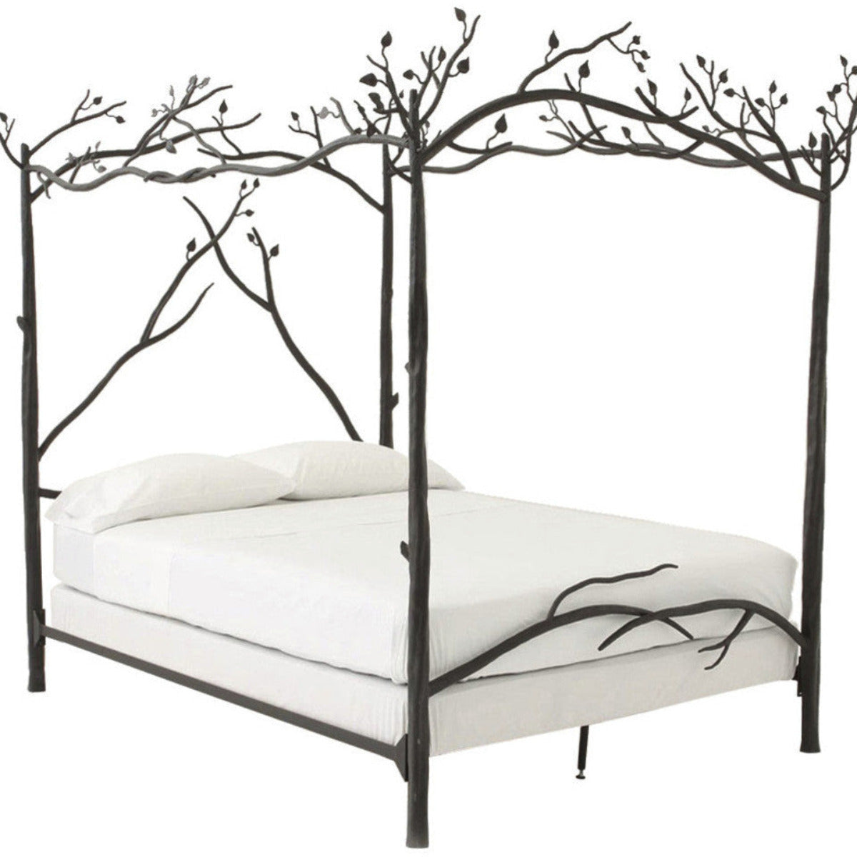 A canopy bed with a hand-forged iron frame featuring a leafy branch design and a white mattress.