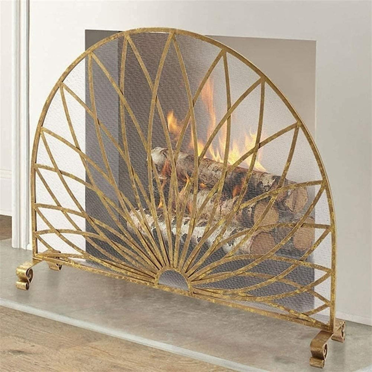 Decorative gold fireplace screen with geometric design on a white background