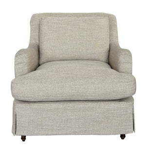 A single upholstered armchair with a textured woven fabric in a light beige-gray color, featuring a high back, rolled arms, and a skirted base on dark wooden legs, shown against a plain white background.