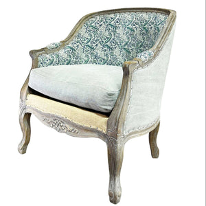 An antique-style upholstered accent chair with a distressed gray wood frame, a light gray fabric seat cushion, a beige upholstered front apron, and a green and white damask patterned backrest, shown on a white background with a model number and dimensions at the bottom.