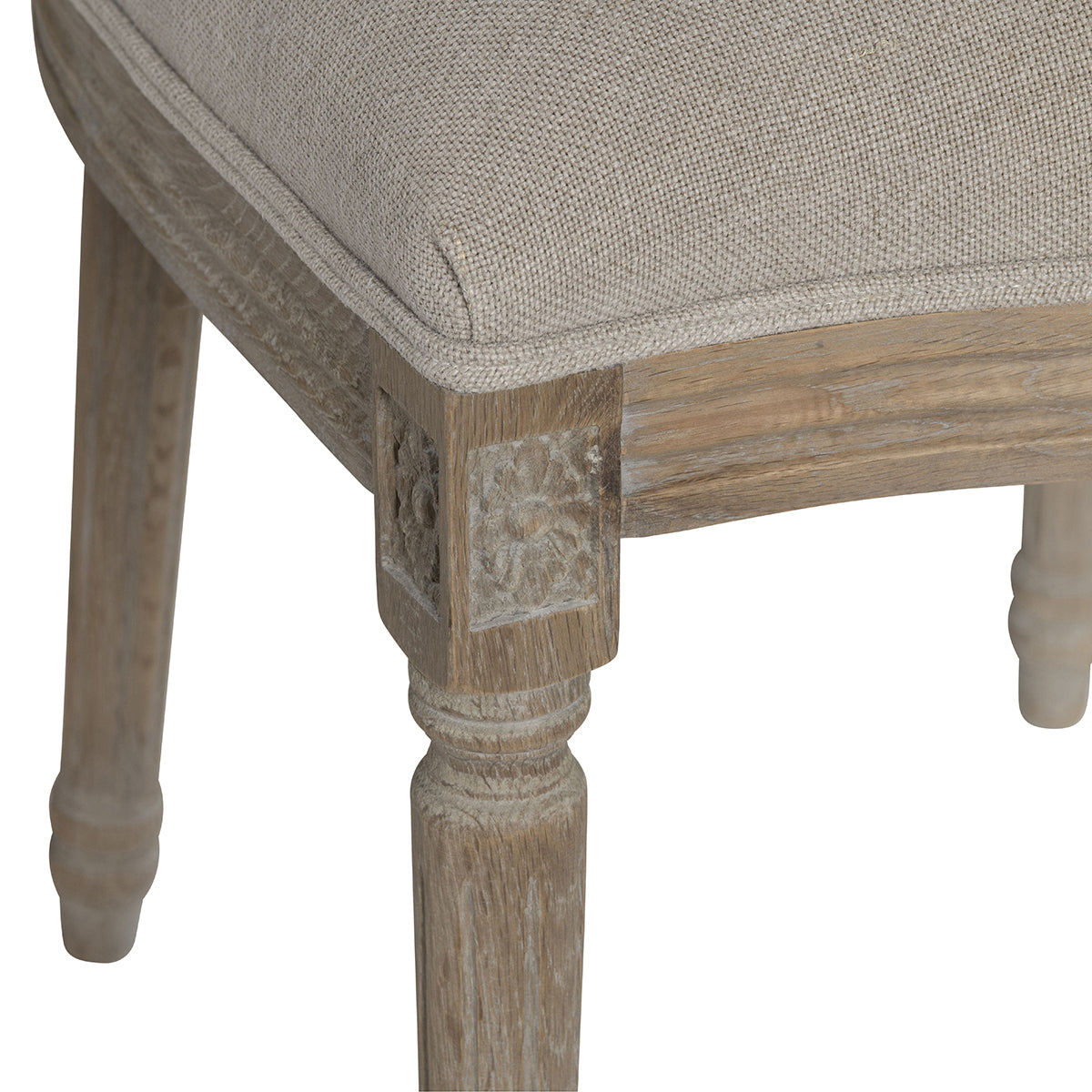 Wooden chair with a beige cushioned seat on a white background
