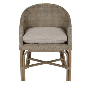 Woven chair with a cushion on a white background
