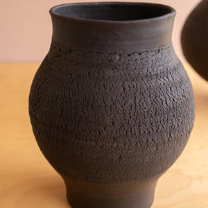 Taller black textured clay vase
