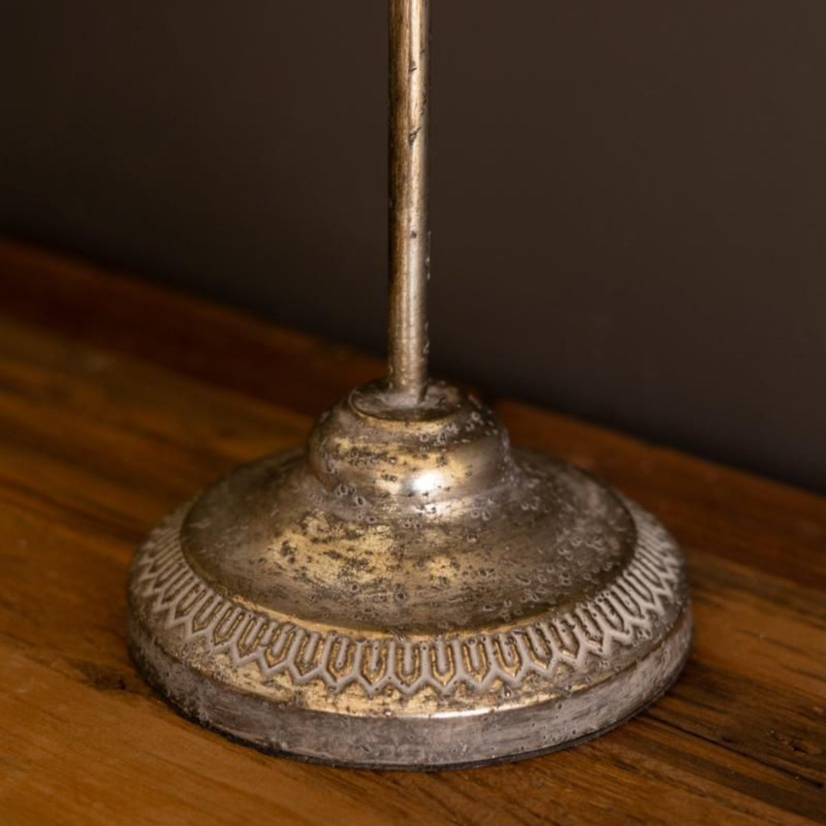 Distressed iron lamp base detail