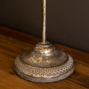 Distressed iron lamp base detail
