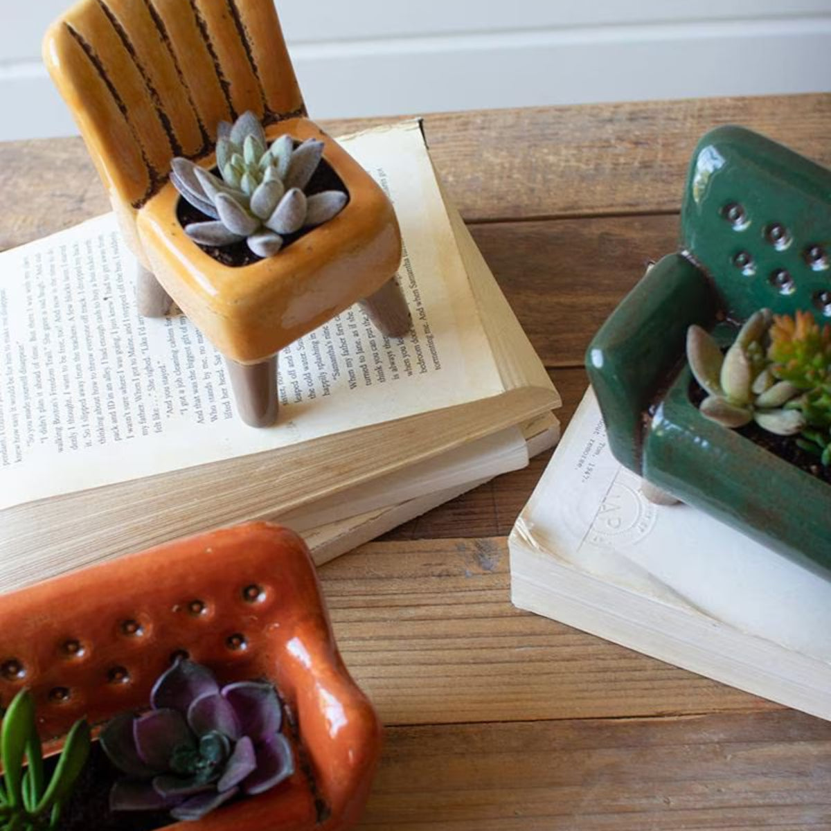 Ceramic mini sofa and armchair planters with succulents