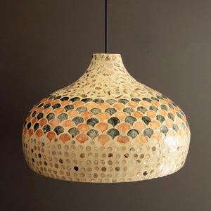 Coral and Blue Capiz Dome Pendant Light hanging in a room