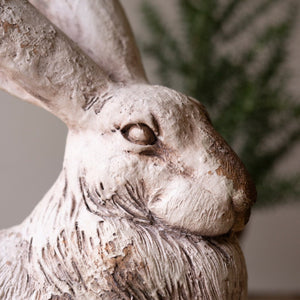 Another view of the faux concrete rabbit sculpture