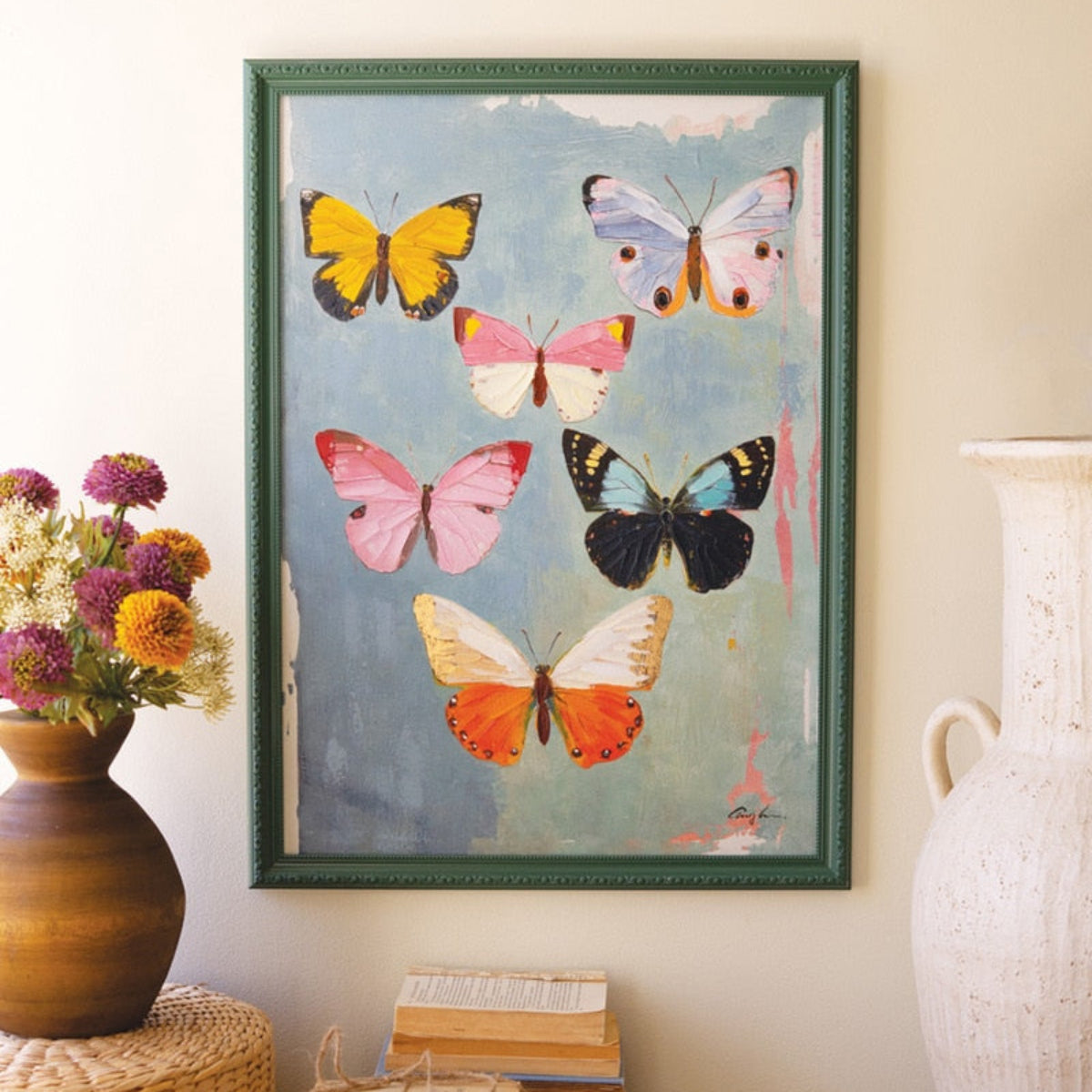 Framed canvas art with six colorful butterflies on blue