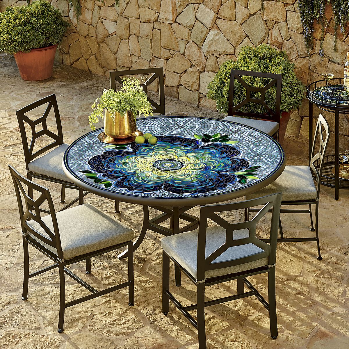 Colorful handcrafted mosaic table with an intricate floral pattern