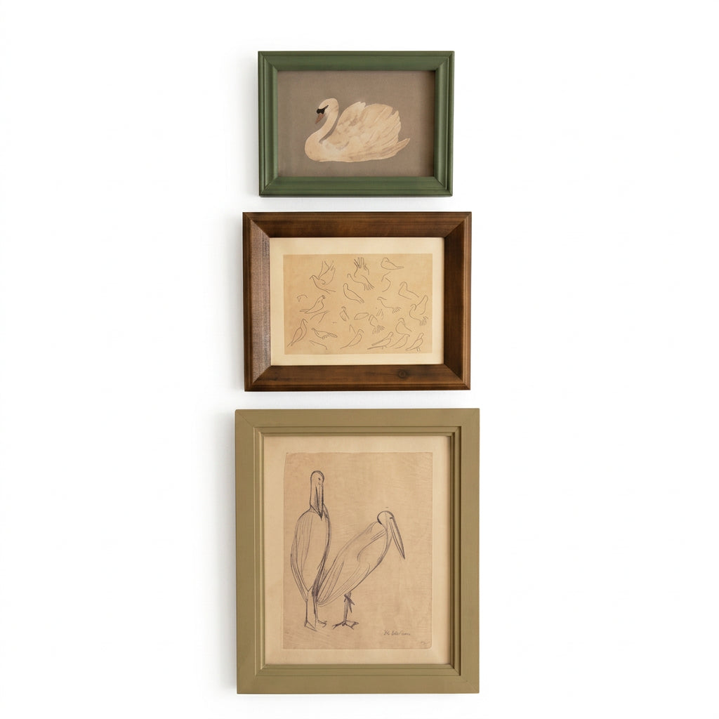 Three framed bird sketch prints in graduated sizes on a white background