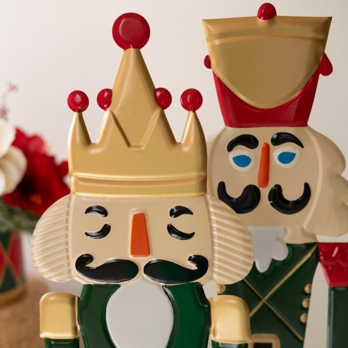 Oversized Painted Metal Nutcrackers, pair of 42 inch red and green iron nutcrackers
