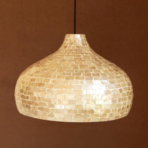 Pearl Dome Capiz and Bamboo Pendant Light hanging in a room