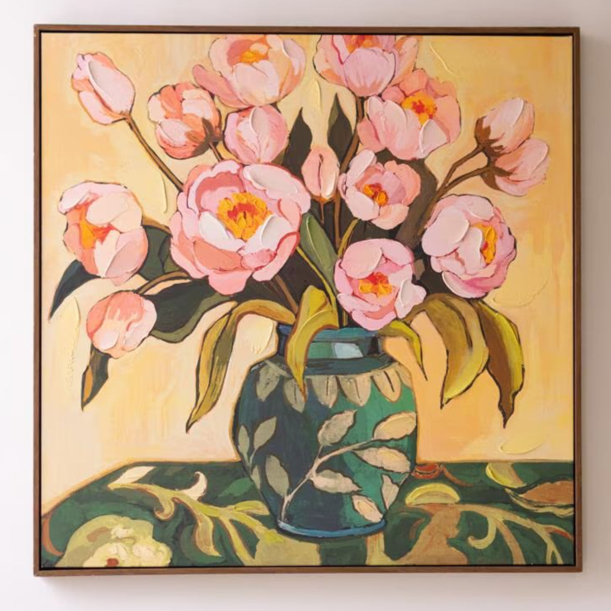 Pink flowers in blue vase framed wall art on a white background