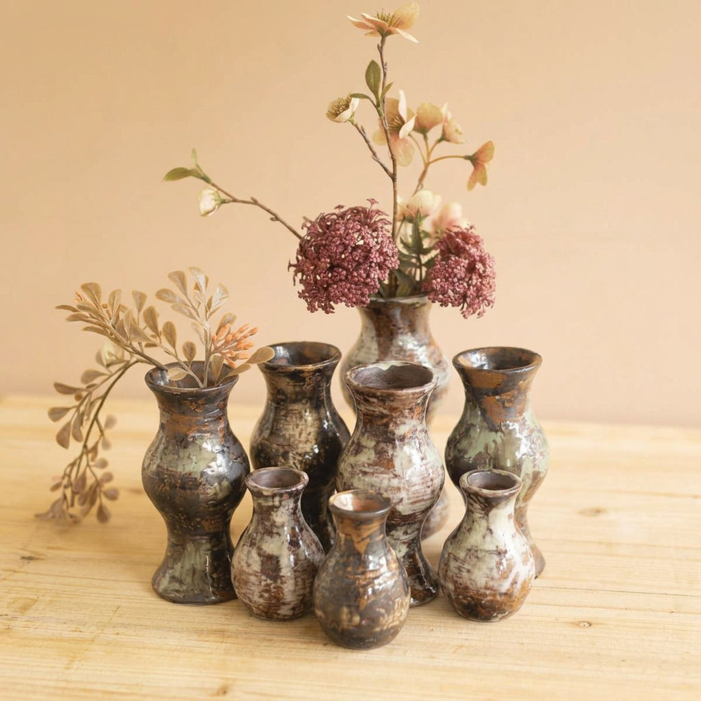 Set of 9 rustic glazed ceramic bud vases with dried florals