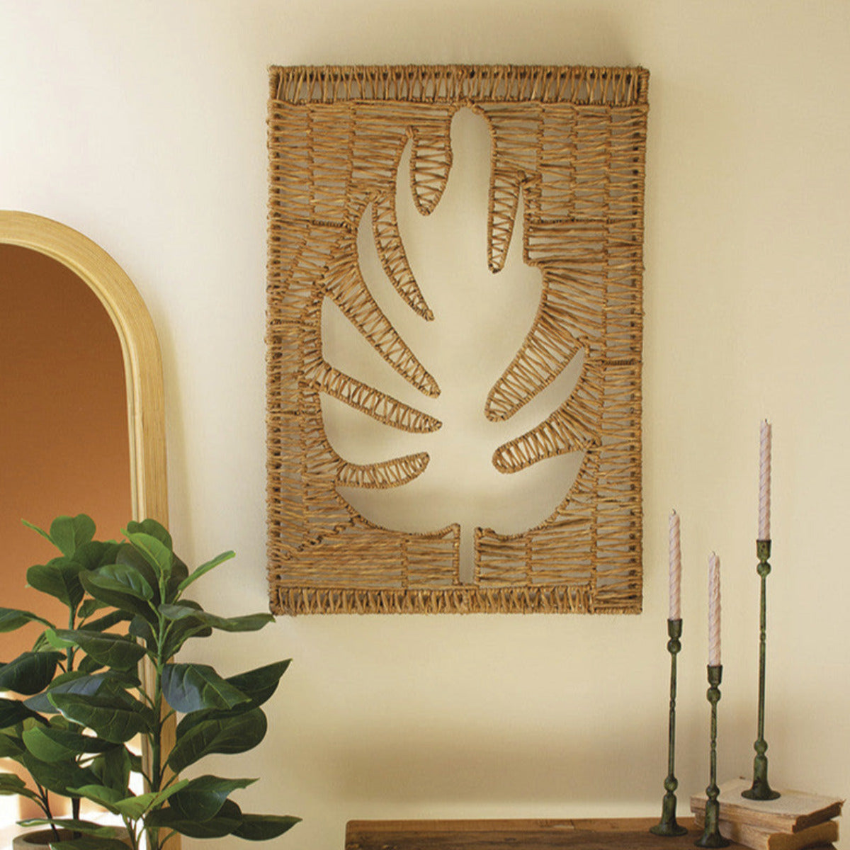 Handcrafted woven seagrass and iron leaf wall panel