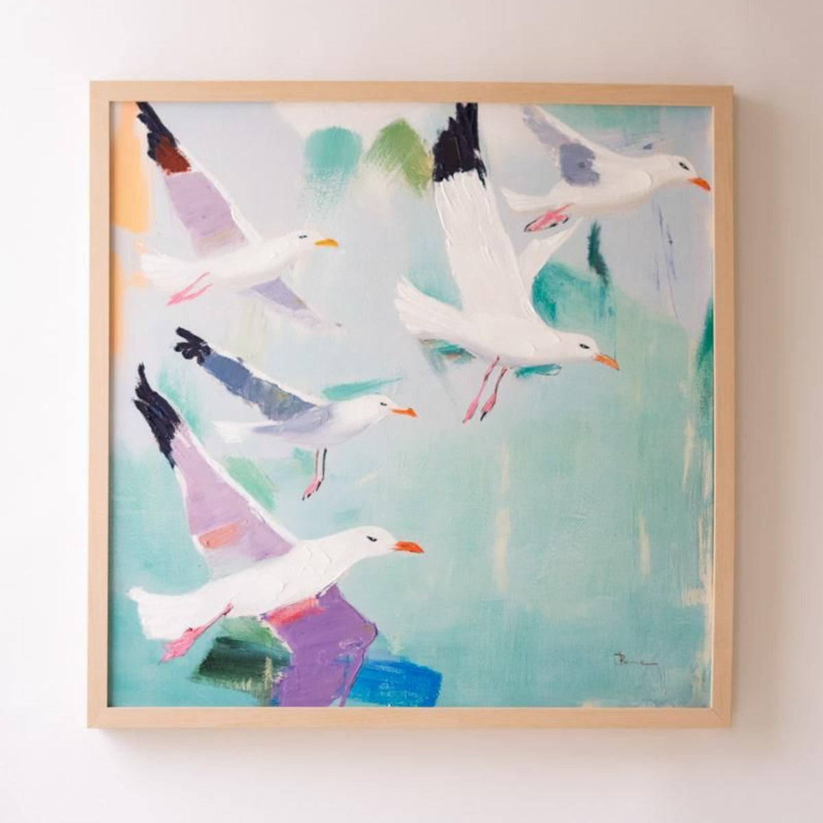 Framed seagull canvas art on a white background