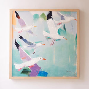 Framed seagull canvas art on a white background