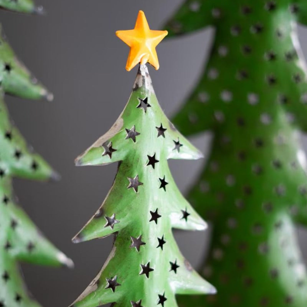 Starlit Iron Christmas Trees, set of 3 green recycled iron trees with gold star toppers on wood bases