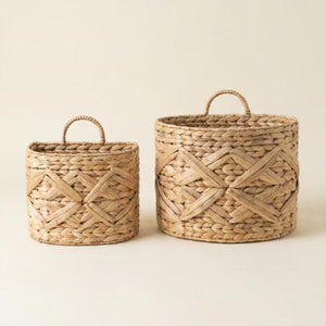 Set of 2 woven wall baskets on a white background