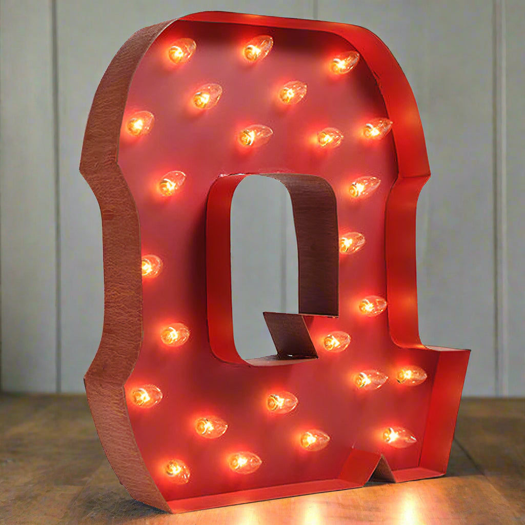 Dimensional lighted metal letter wall decor