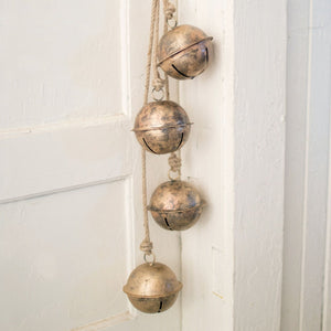 String of aged gold metal bells for a rustic Christmas door
