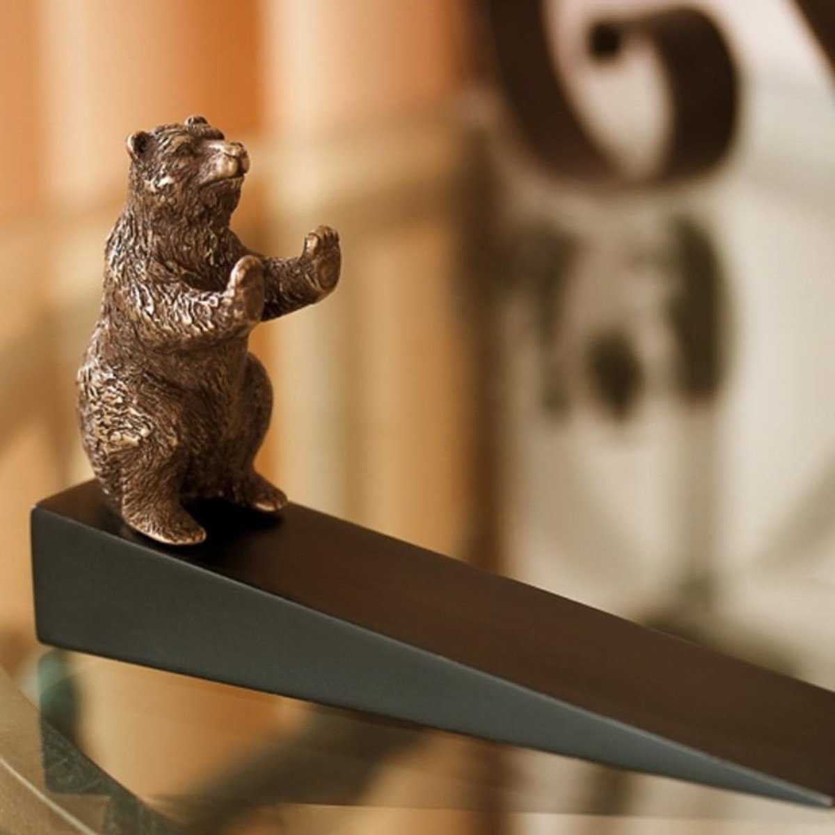 Decorative bear door stop with sculptural character