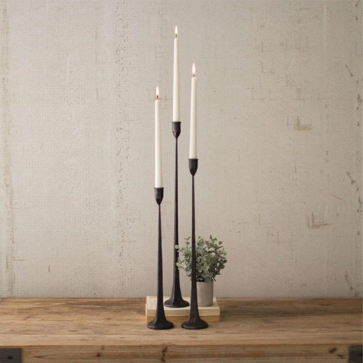 Set of 3 tall black cast iron taper candle holders