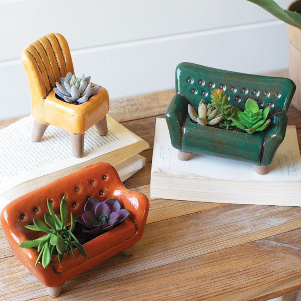 Ceramic mini sofa and armchair planters with succulents