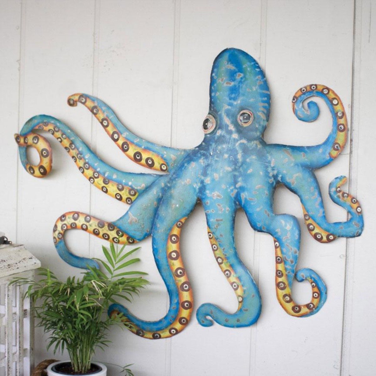 Blue hand-hammered recycled metal octopus wall art